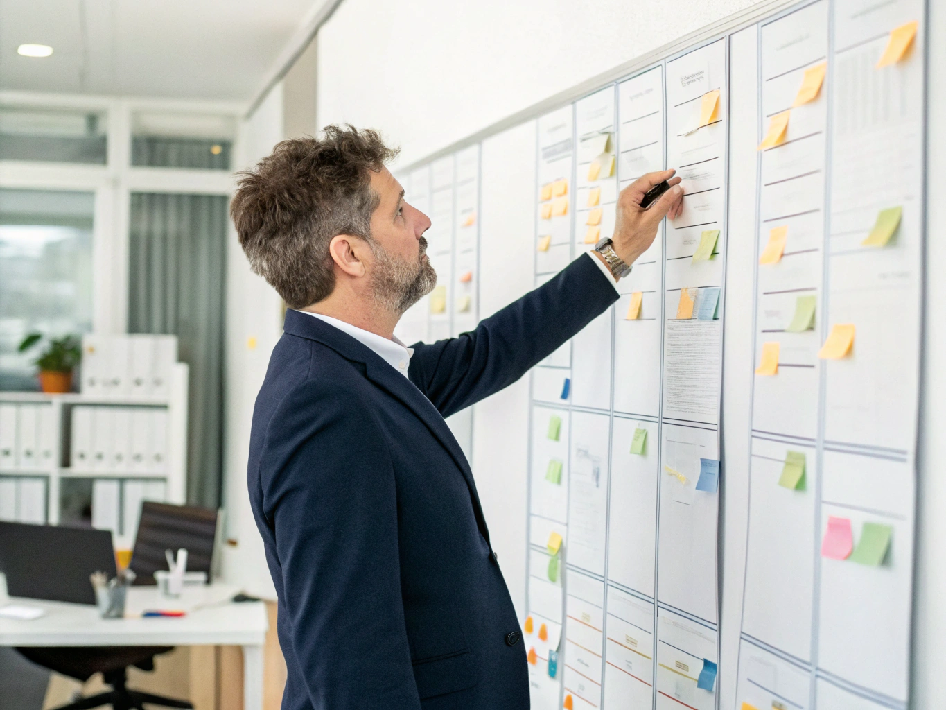 Production schedule planning Manager planning shipments with sticky notes board (ID#4)