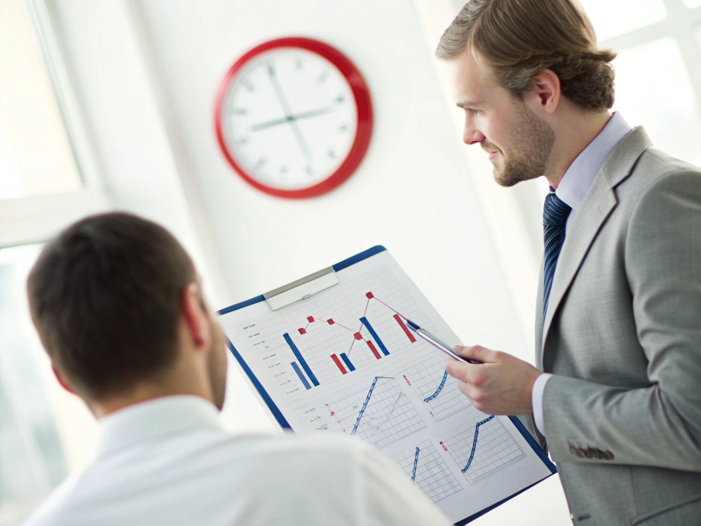 Financial discussion Business meeting analyzing financial reports (ID#5)