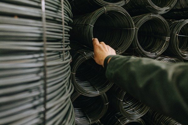 Close-up of metal coils and hand (ID#2)