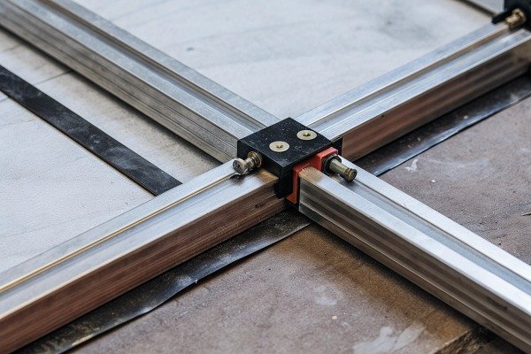 Close-up of metal frame joint with bolts (ID#4)