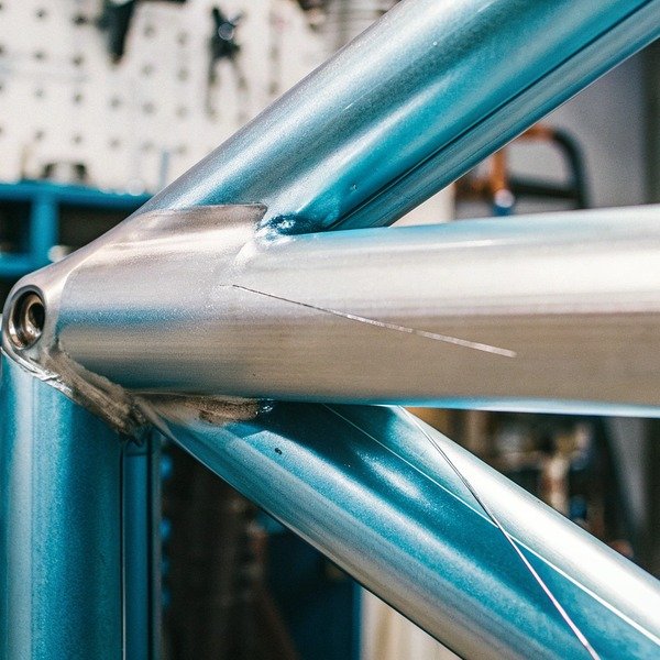 Close-up of metal frame welding joint (ID#1)