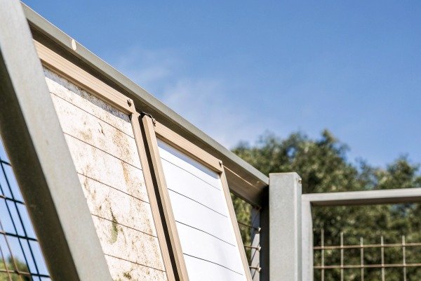 Metal fence panel with blue sky background (ID#3)