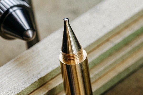 Close-up of metal lathe tool tip (ID#5)