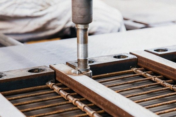 Close-up of metal welding process on steel bars (ID#4)
