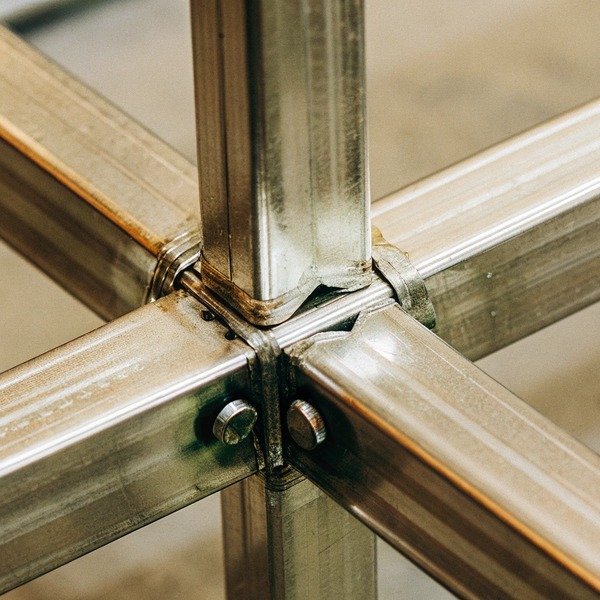 Close-up of metal joint with bolts (ID#1)