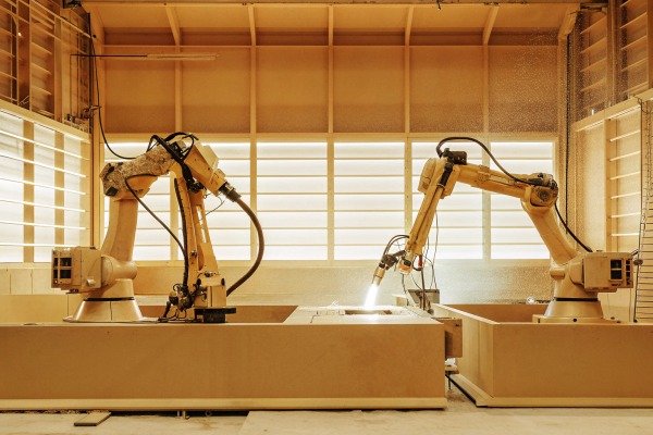 Robotic arms working in manufacturing plant (ID#3)