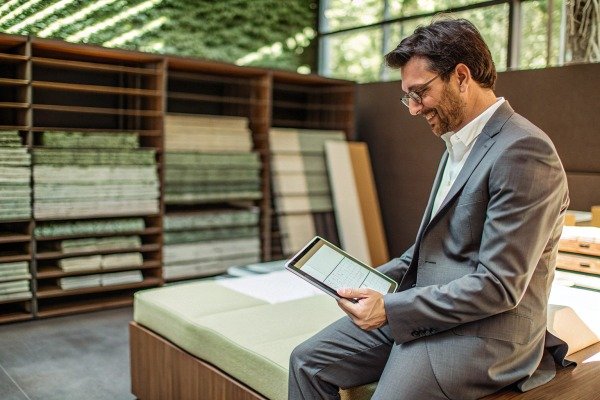 Man using tablet in modern office space (ID#5)