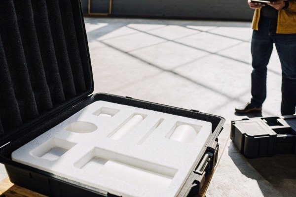 Auditor with tablet reviewing shop floor processes and SPC data (ID#5)